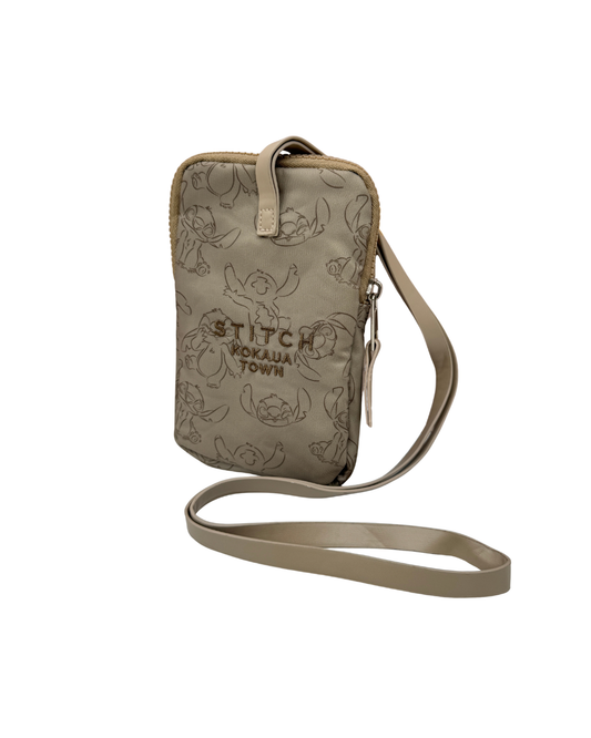 Bolso porta móvil Disney Stitch de la colección Kokaua Town con logo bordado y correa bandolera.